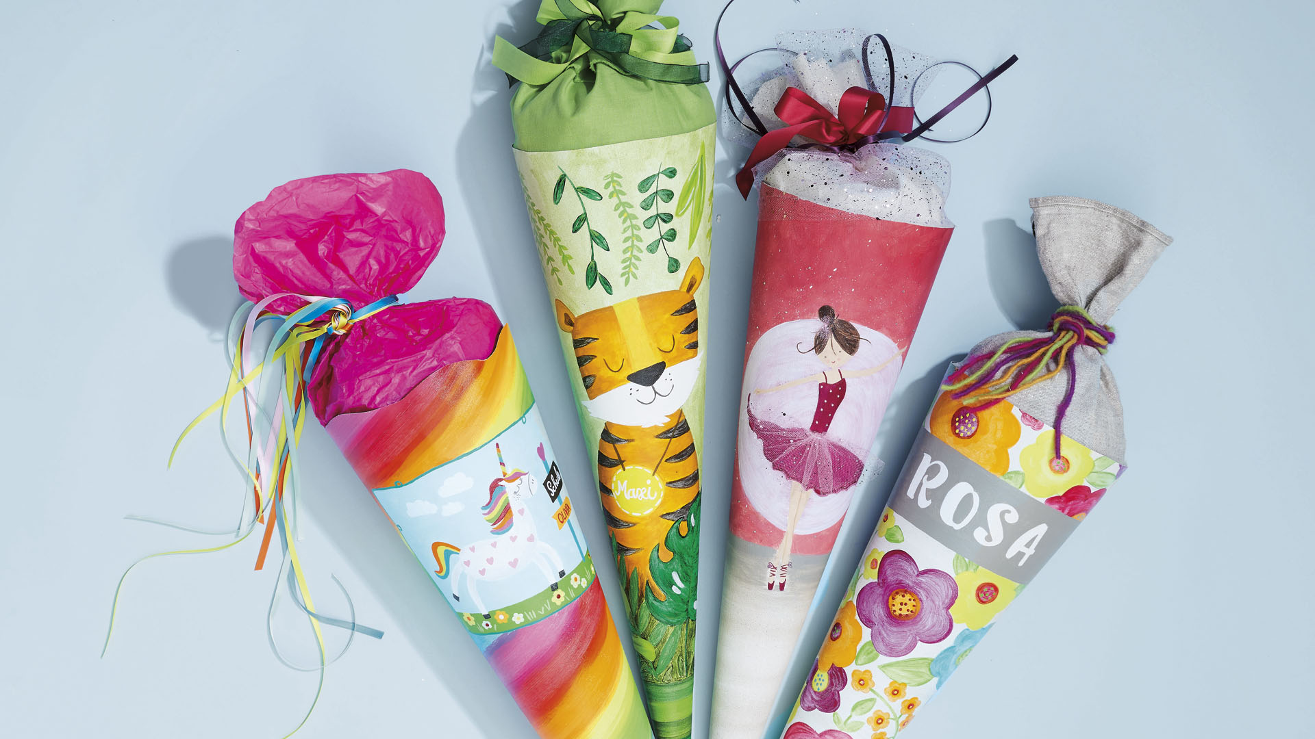 Ideen für Schultüten: kunterbuntes Einhorn, gemütlicher Tiger, Ballerina und farbenfrohe Blumenwiese | Gemalt mit Acrylfarben auf Leinwand