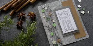 Ideen für die Weihnachtspost: Sternenglanz | lustige Weihnachtskarte in Silber, Grau, Natur in Grüntönen mit drei gestempelten Elchen als Motiv